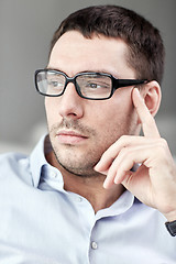 Image showing portrait of  businessman in eyeglasses at office