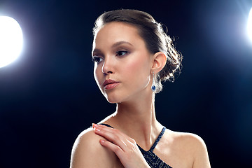 Image showing beautiful young asian woman with earring