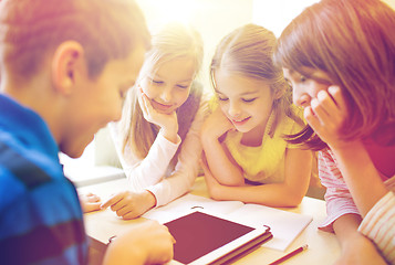 Image showing group of school kids with tablet pc in classroom