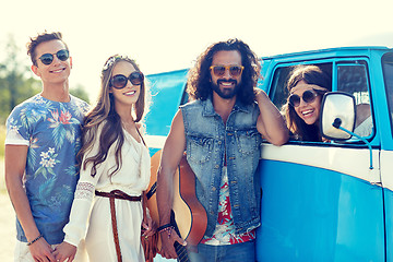Image showing happy hippie friends with guitar over minivan car