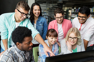 Image showing international students with computers at library