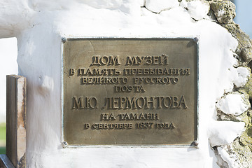 Image showing Taman, Russia - March 8, 2016: Information plaque at the entrance to the house-museum in memory of the great Russian poet of stay MY Lermontov\'s Taman in September 1837