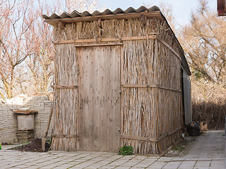 Image showing Old straw barn