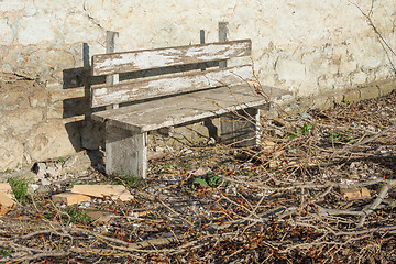 Image showing Old abandoned shop at an old wall