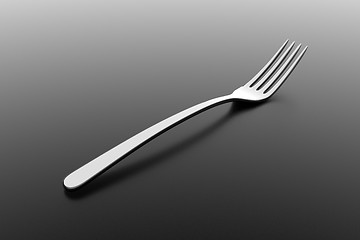 Image showing Silver fork on grey background