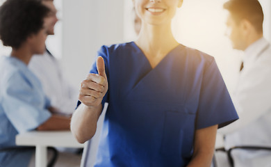 Image showing close up of doctor showing thumbs at hospital