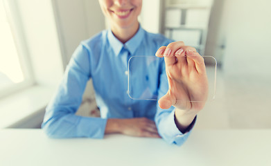 Image showing close up of woman with transparent smartphone