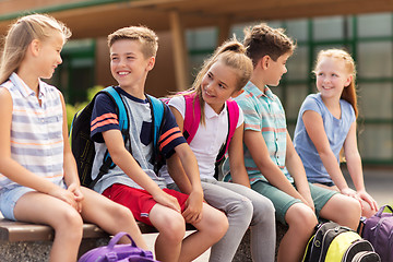 Image showing group of happy elementary school students talking