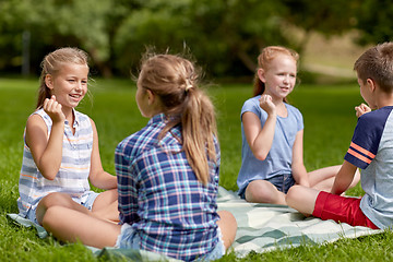 Image showing happy kids playing rock-paper-scissors game