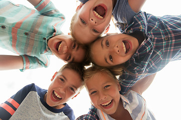 Image showing group of happy children faces in circle