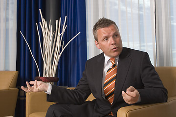 Image showing Businessman talking