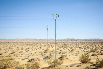 Image showing Power lines in Sahara desert
