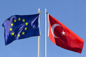 Image showing European Union flag and flag of Turkey on flagpole