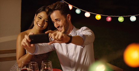 Image showing Attractive young couple posing for a selfie