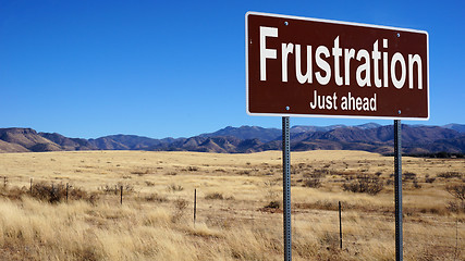 Image showing Frustration brown road sign