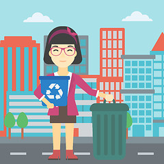 Image showing Woman with recycle bin and trash can.