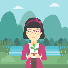 Image showing Woman holding plant vector illustration.