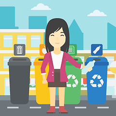 Image showing Woman throwing away plastic bottle.