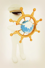 Image showing Sailor with wood steering wheel and earth. Trip around the world