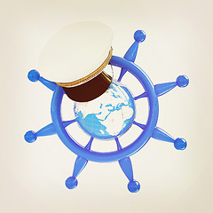 Image showing Steering wheel with Earth, and marine cap . Trip around the worl