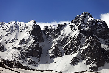 Image showing Snow rocks at spring wind day