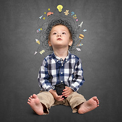 Image showing Little boy thinking