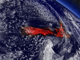 Image showing New Zealand from space highlighted in red