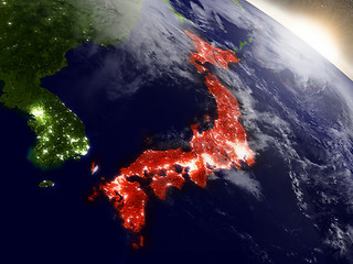 Image showing Japan from space highlighted in red