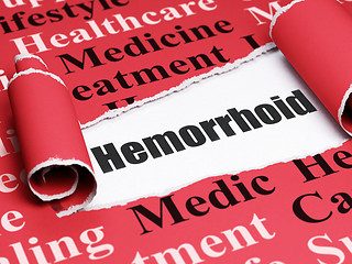Image showing Health concept: black text Hemorrhoid under the piece of  torn paper
