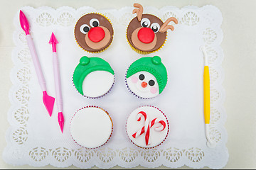 Image showing Closeup of funny christmas cupcakes