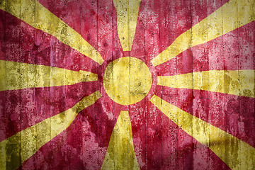 Image showing Grunge style of Macedonia flag on a brick wall