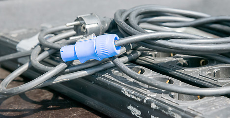Image showing blue electric plug on black cable