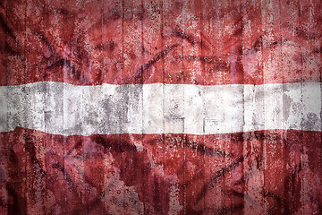 Image showing Grunge style of Latvia flag on a brick wall