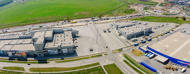 Image showing Road construction and shopping centers. Tyumen