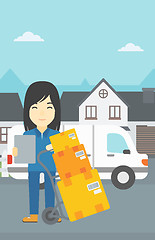 Image showing Delivery woman with cardboard boxes.