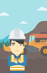 Image showing Miner with mining equipment on background.