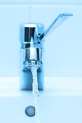 Image showing running faucet blue tint