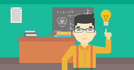 Image showing Student pointing at light bulb vector illustration