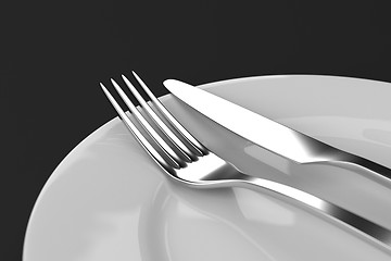 Image showing Fork and knife with plates