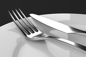 Image showing Fork and knife with plates