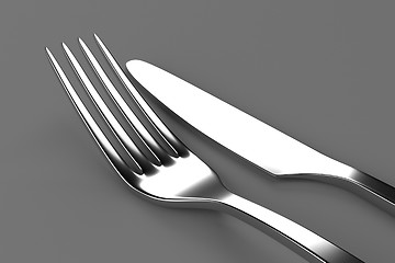 Image showing Fork and knife on grey