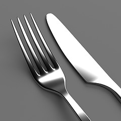 Image showing Fork and knife on grey