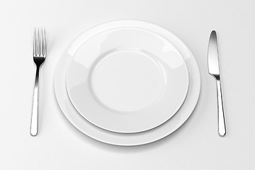 Image showing Fork and knife with plates