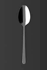 Image showing Silver spoon on a table