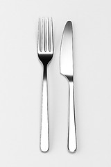 Image showing Fork and knife on grey