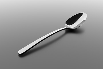 Image showing Silver spoon on a table
