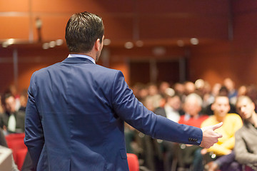 Image showing Public speaker giving talk at Business Event.