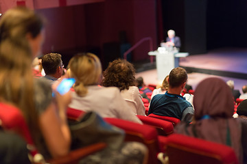 Image showing Business speaker giving a talk in conference hall.