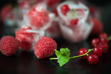 Image showing Frozen berries on wooden table