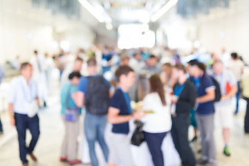 Image showing Abstract blurred people socializing during lunch break at business conference.